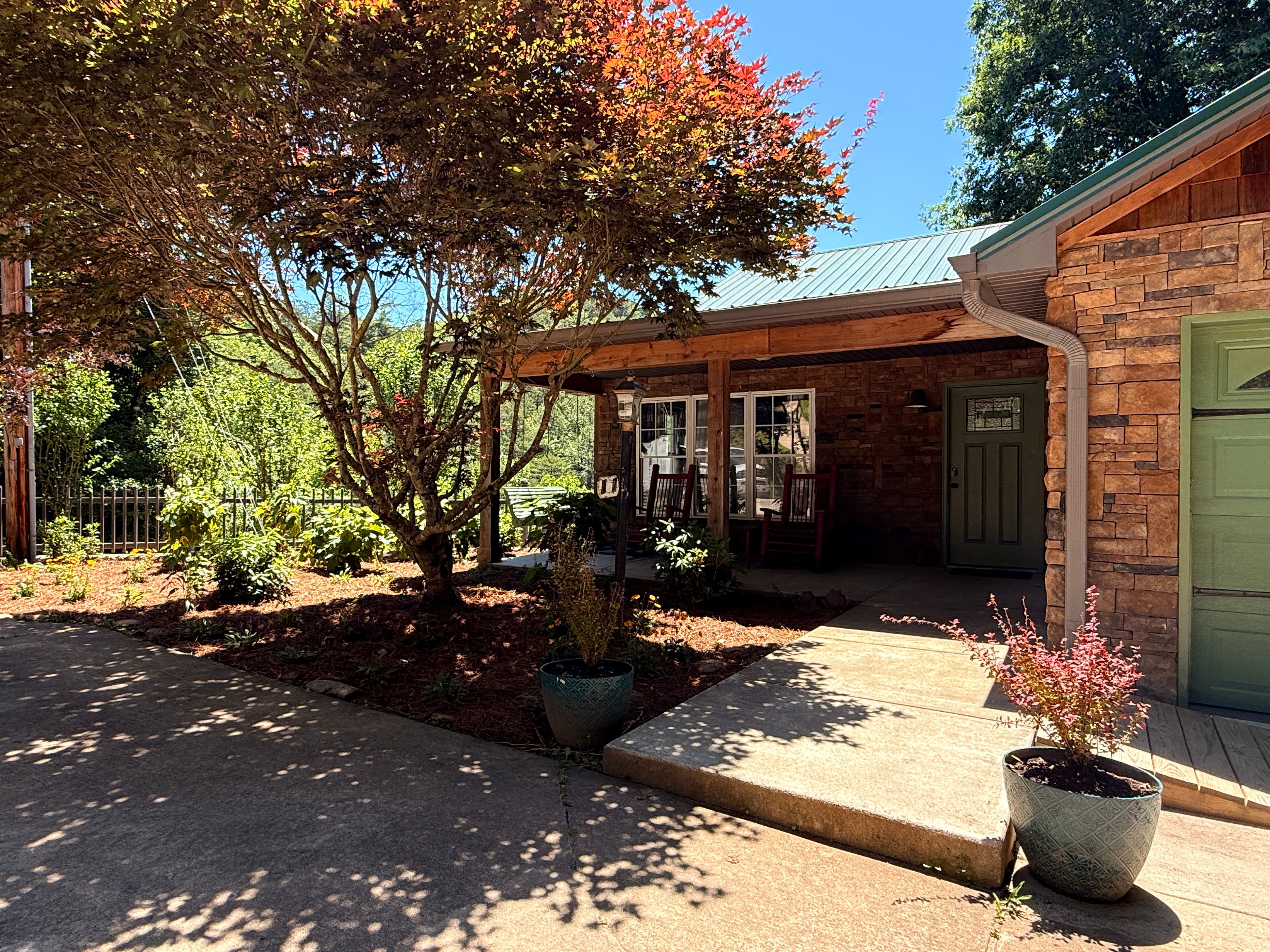 livingstone-great-house-luxury-estate-exterior-front with ridgeline views and large spaces