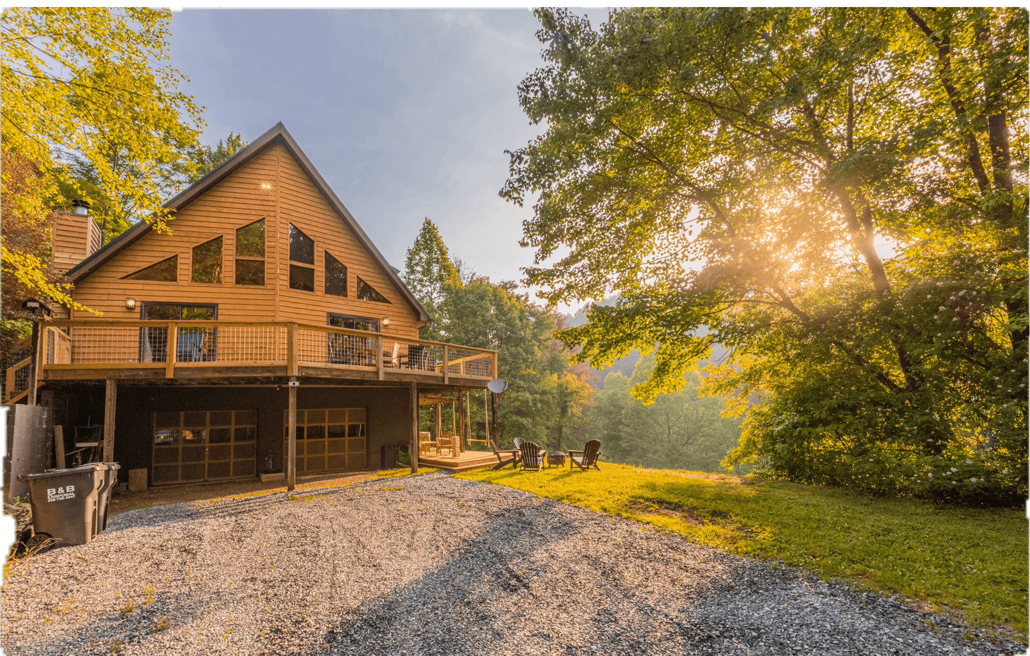 Exterior view of The Teddy, a 4-bedroom luxury log cabin at Three Little Bears Retreat in the Great Smoky Mountains of Bryson City, NC.