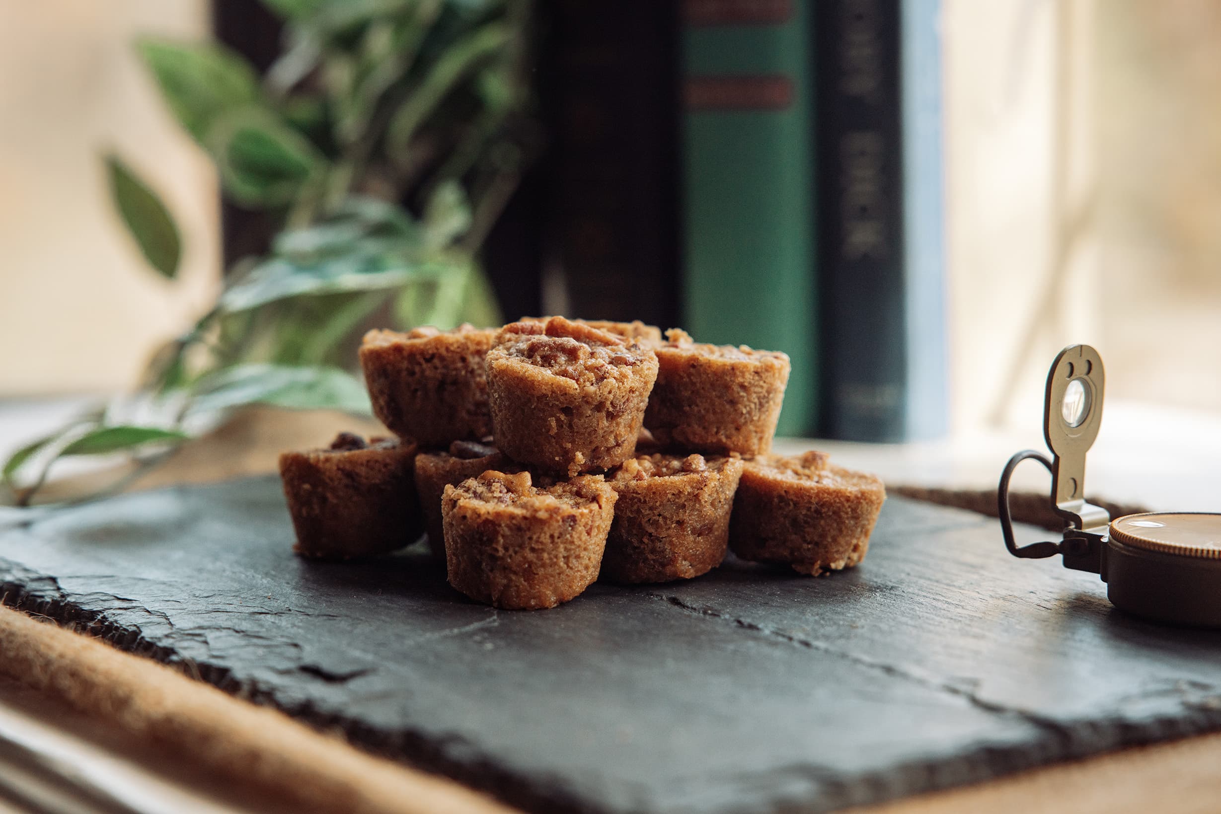 A tray of freshly baked signature mini pecan muffins, an exclusive evening treat for guests staying at Three Little Bears Retreat in Bryson City