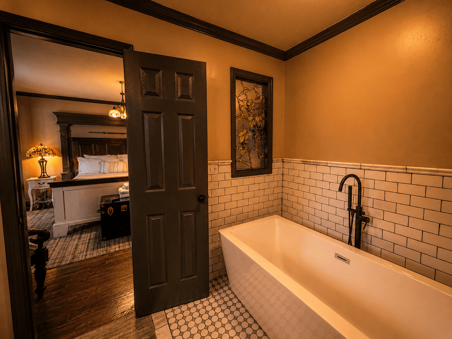 Luxury bathroom with freestanding soaking tub at Livingstone Station Lodge in Bryson City, North Carolina.