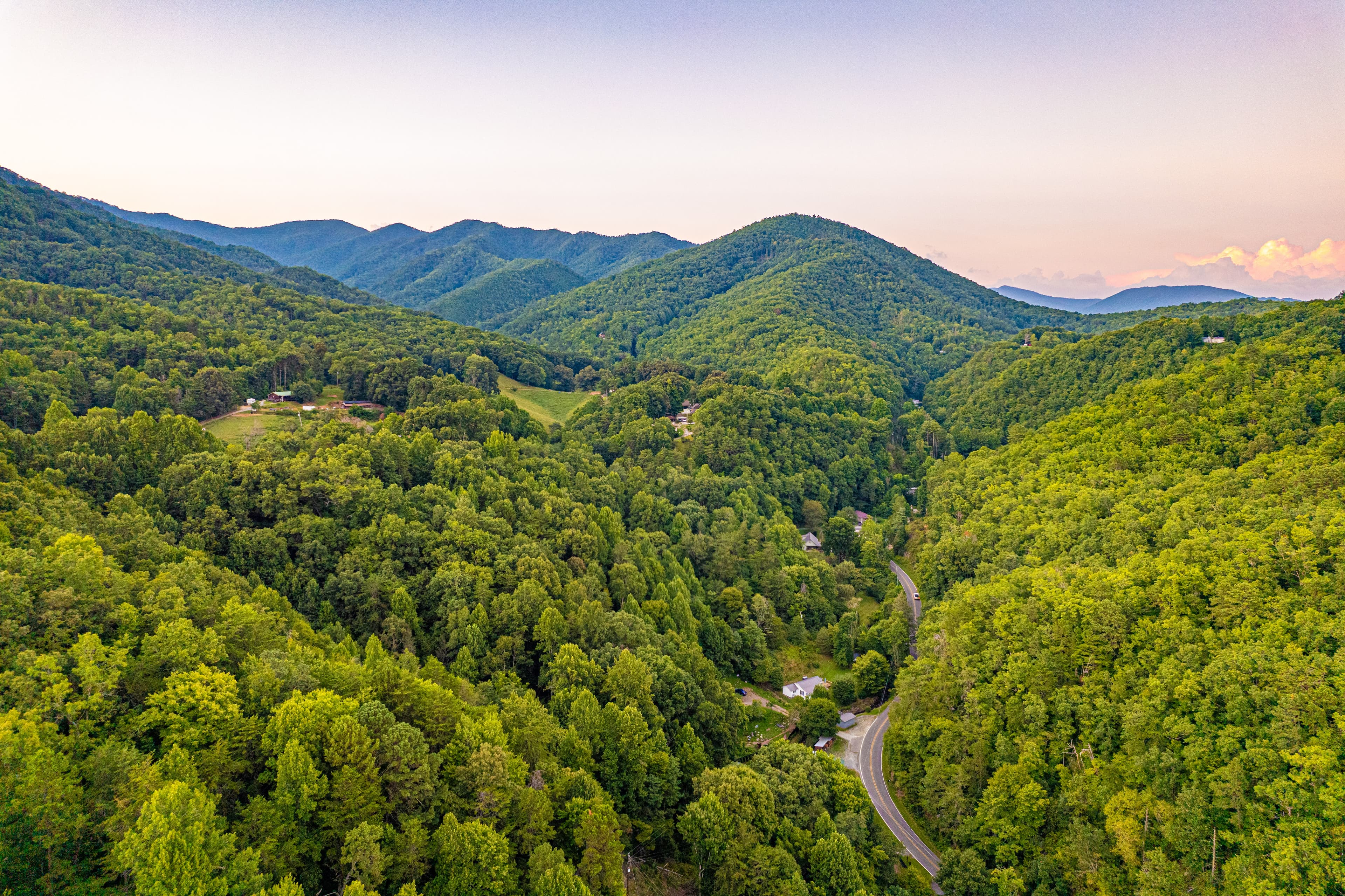 View of lands creek valley where Three Little Bears Retreat is located and sharp top mountain behind