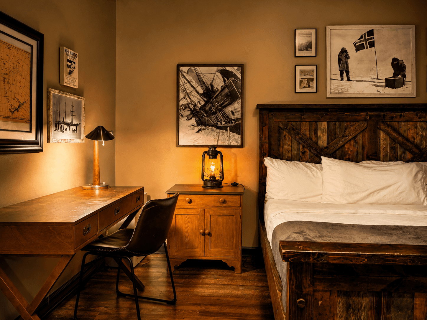 Family Suite: 1 of 3 rooms featuring King bed Polar Explorer-themed king bedroom at Livingstone Station Lodge featuring handcrafted furnishings and expedition-inspired décor in Bryson City, North Carolina.