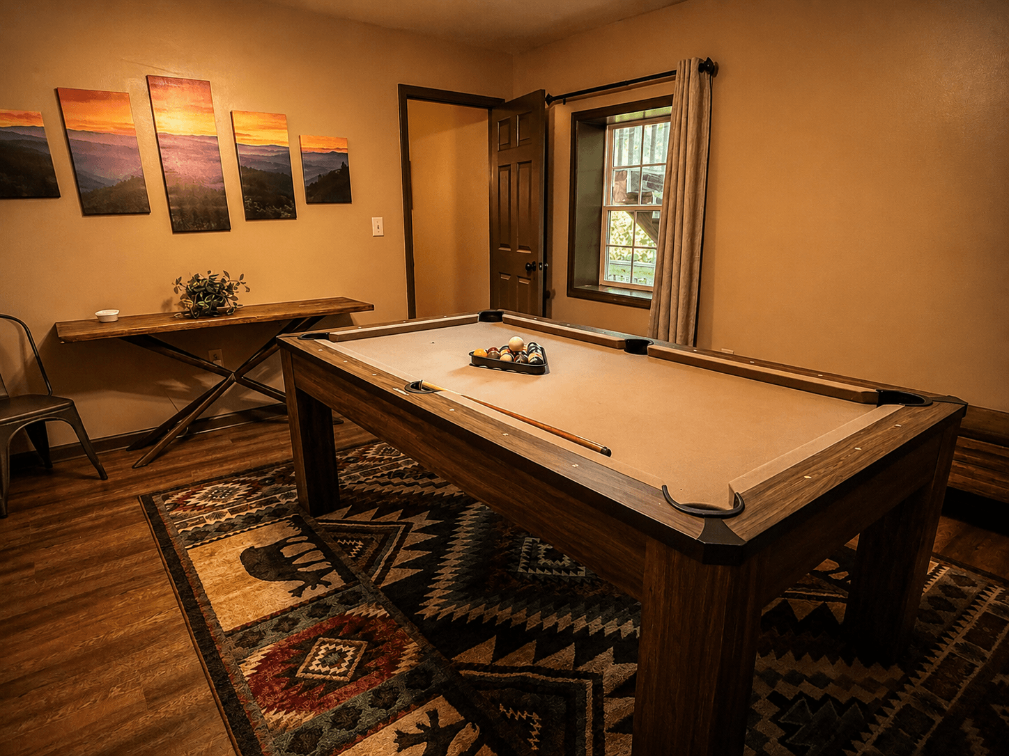 Private game room with pool table at Livingstone Station Lodge at Three Little Bears Retreat in Bryson City, North Carolina.