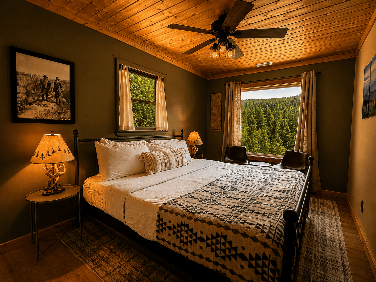 Secondary Guest bedroom with a king-sized log bed, luxury linens, themed to honor John Muir and picture window with mountain view